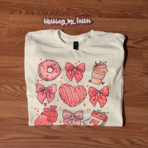 White Shirt with Pink Graphic Design